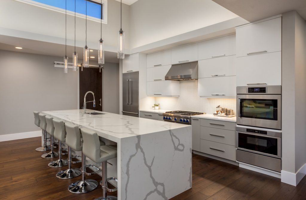Modern white cabinets and waterfall 1